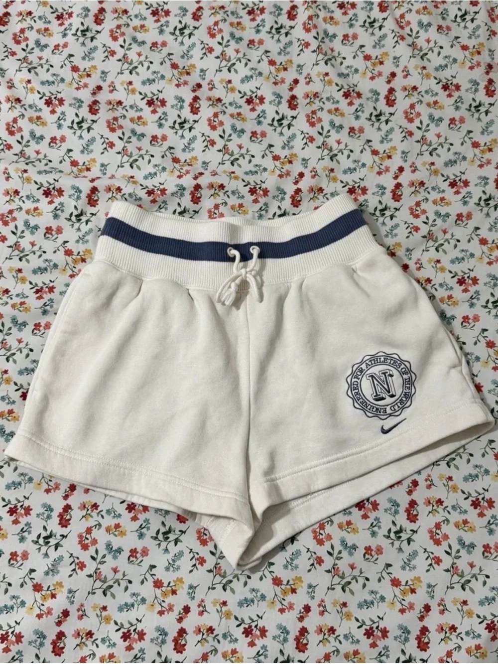Nike White Athletic Shorts with Navy Waistband and Crest
